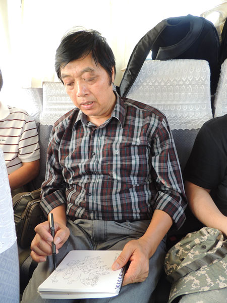 画家邓军在“当代书画家雪域梵音圣境之旅”采风活动中速